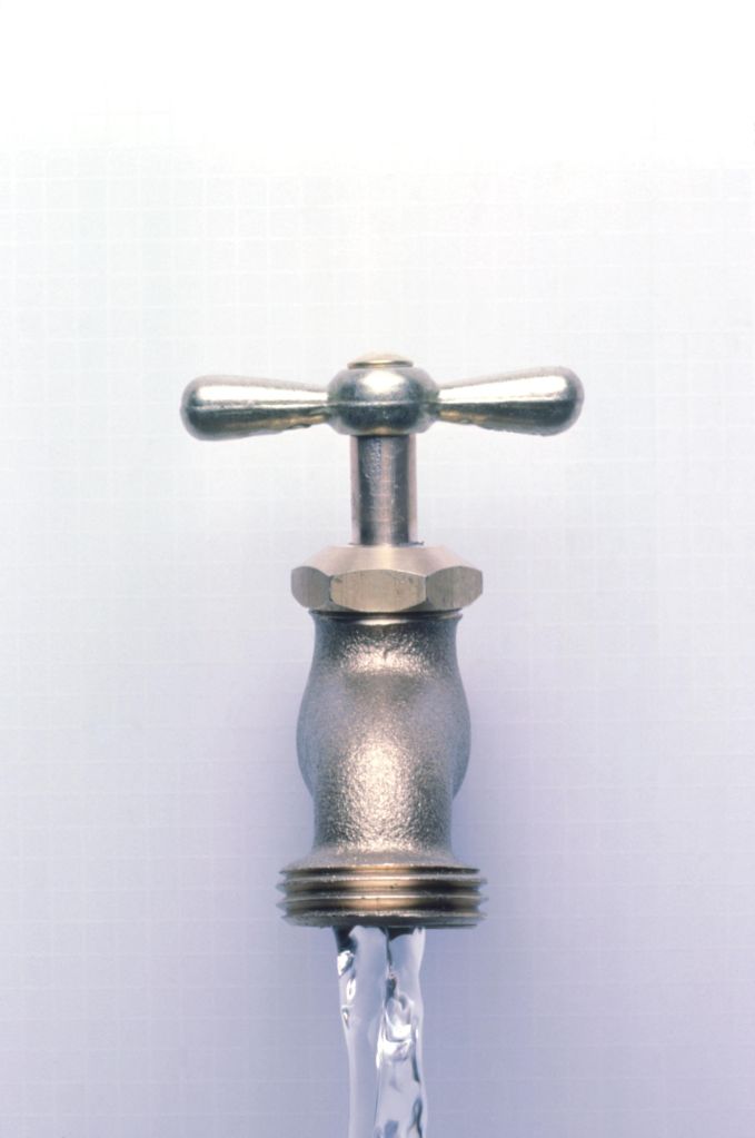 water coming out of a faucet