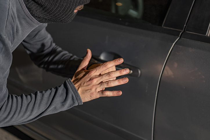 A Thief in Action of Stealing Car