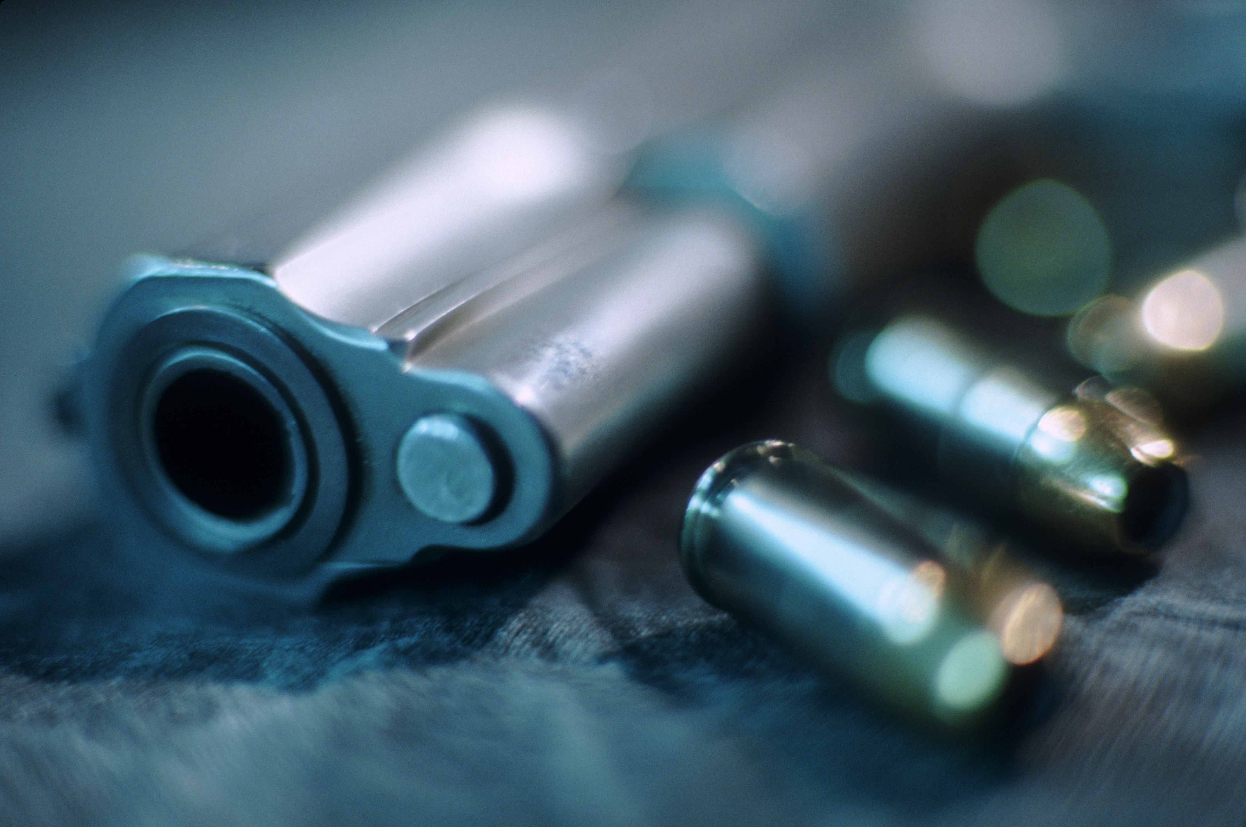 Gun and Bullets - stock photo