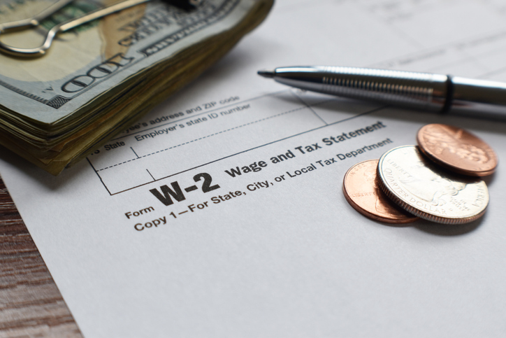 W-2 Tax Form Close Up With Money And Expensive Pen High Quality
