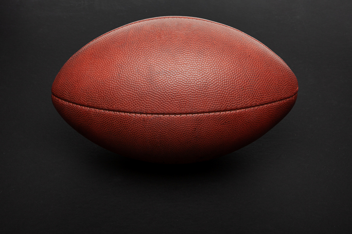 Football shot in studio on black background